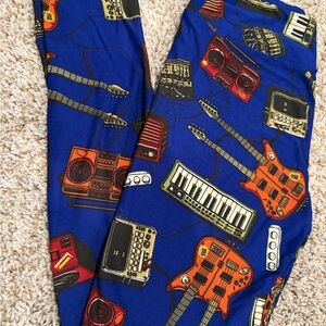 LulaRoe Dark Blue Leggings with Musical Instrument Print